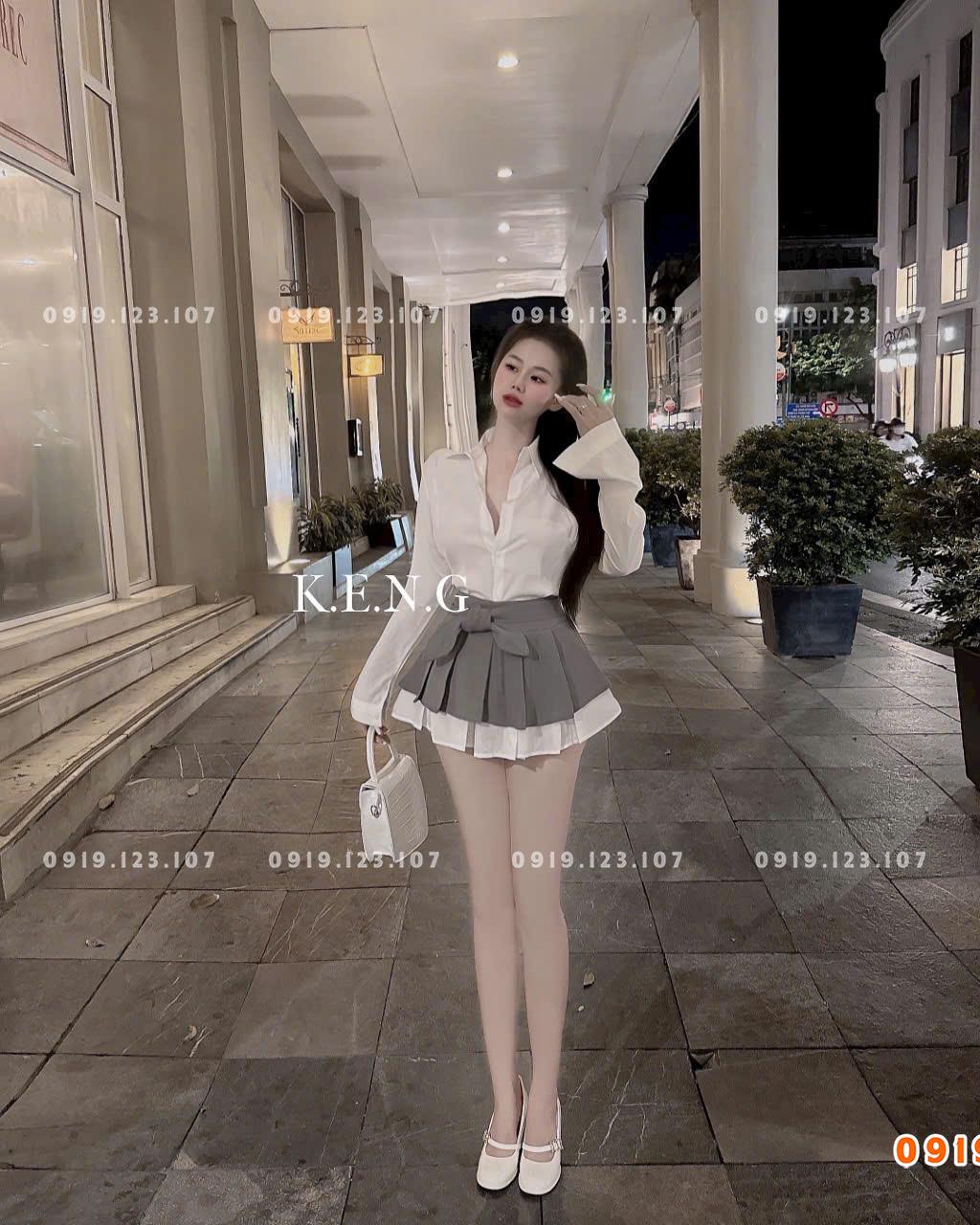 Set sơ mi  tay dài chân váy xếp ly nơ to chuẩn mẫu - SBT760