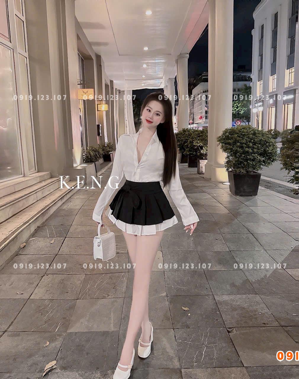 Set sơ mi  tay dài chân váy xếp ly nơ to chuẩn mẫu - SBT760